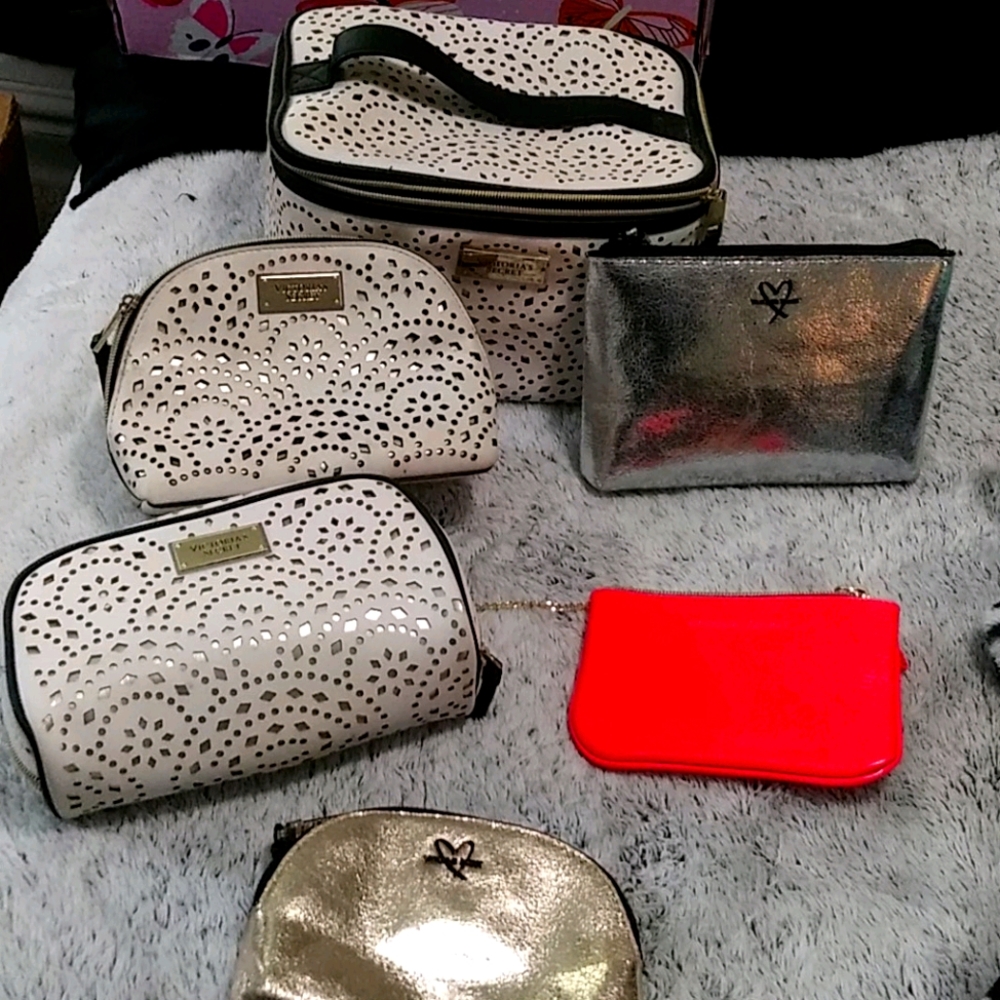 6 Piece Victoria Secret make up cases and keychain